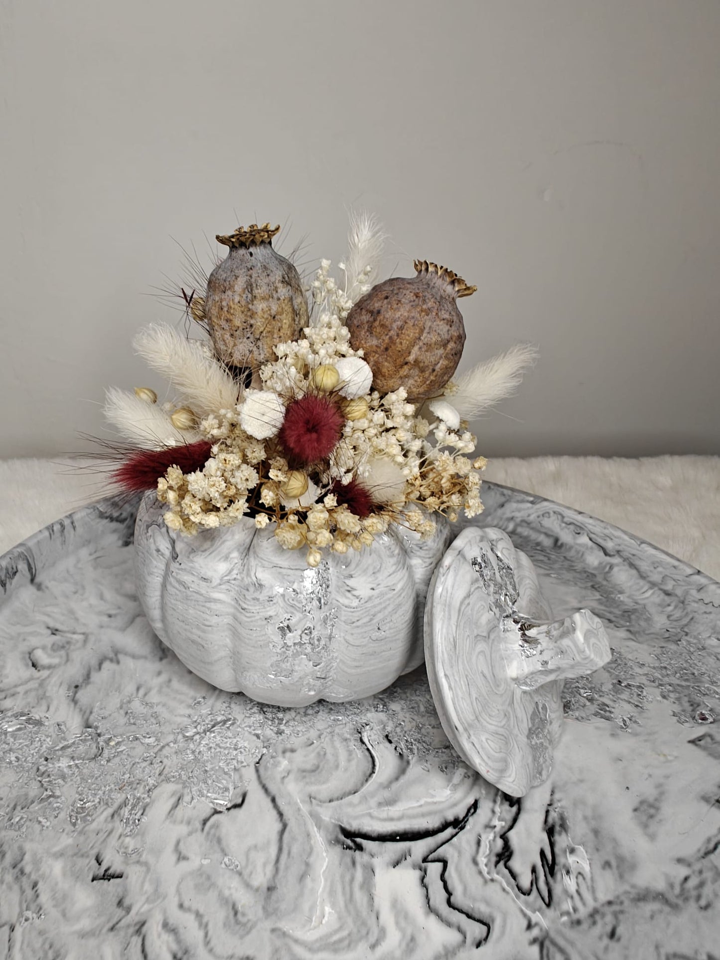 Pompoentje gevuld met droogbloemen